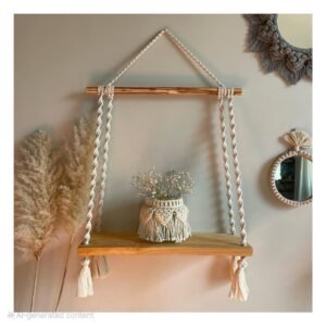 macramé wooden hanging shelf, boho wall shelf, macramé home decor, hanging shelf for plants, boho chic decor, cotton rope shelf, rustic wooden shelf, handmade macramé shelf, floating shelf boho, woven macramé shelf, wall hanging shelf, aesthetic shelf decor, minimalist home decor